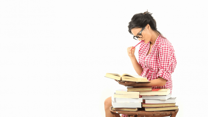 Girl Writing an Assignment Girl Writing an Assignment