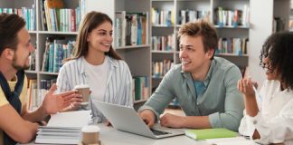 6 Websites to Get Qualified Study Help Group of young students at table in library. Banner design