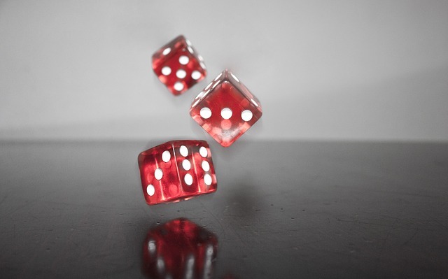 a-group-of-red-dice-description-automatically-gen A group of red dice Description automatically generated with medium confidence