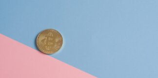 round gold-colored coin