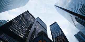 low angle photo of city high rise buildings during daytime