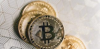 Close Up Photo of Four Bitcoins