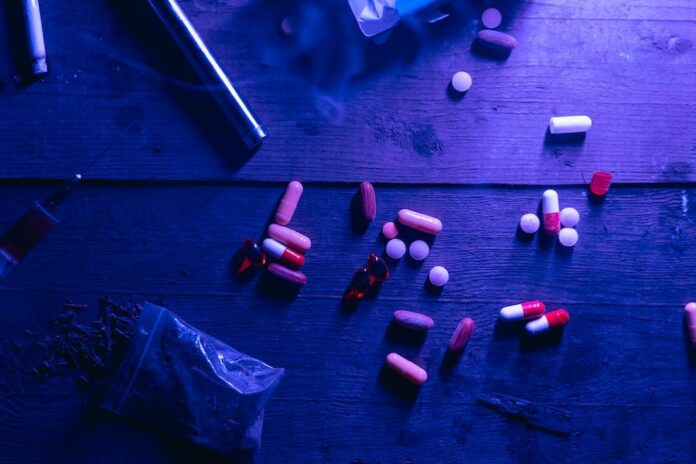 Photo by MART PRODUCTION Illegal Drugs and Cannabis on the Floor