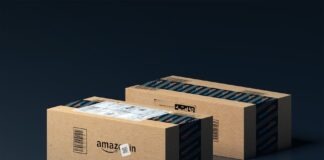 two boxes of amazon are stacked on top of each other