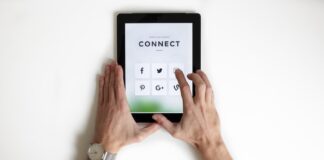 person using black iPad