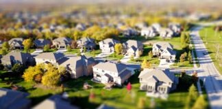 The Green Advantage of Quick Home Sales: How Cash Buyers Boost Eco-Friendly Real Estate Practices High Angle Shot of Suburban Neighborhood