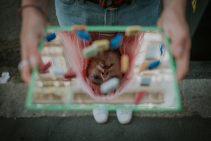Photo by Matteo Badini girl in pink hair doll