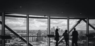 people standing inside city building