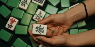 A Glance into the Rich History of Gambling in Asia hands on a keyboard