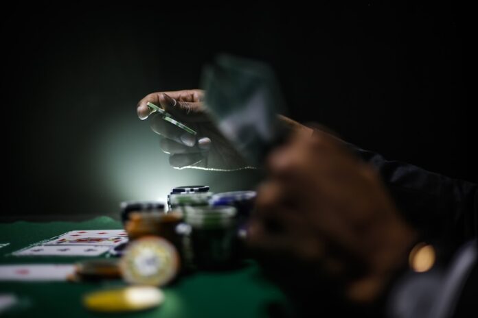 Photo by Keenan Constance selective focus photography of poker chips