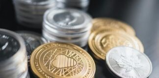 Overcoming Adoption Challenges in the World of Cosmos (ATOM) gold-and-silver-colored coin collection lot