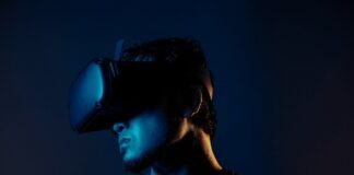 man in black crew neck shirt wearing black headphones