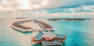 aerial photography of resort rooms and island