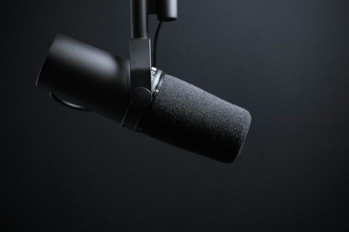 Photo by Jukka Aalho black and silver microphone with white background