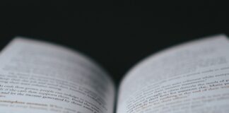white book page with black background