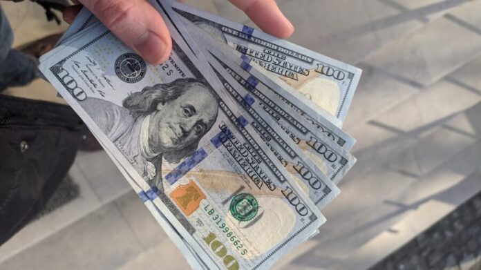 Photo by Frederick Warren 100 us dollar bill