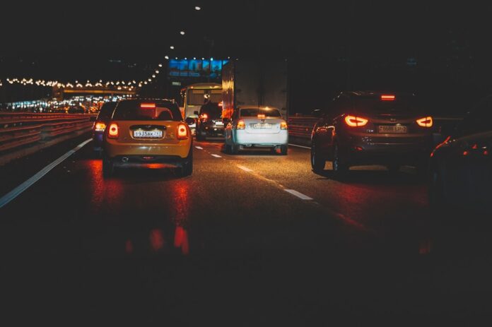 Photo by Egor Myznik cars on road during night time