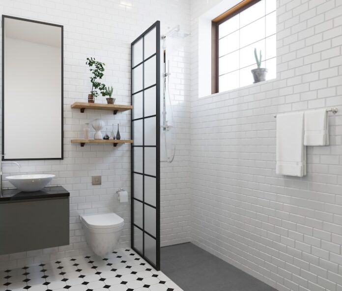 Photo by Hemant Kanojiya a bathroom with a toilet, sink, and shower