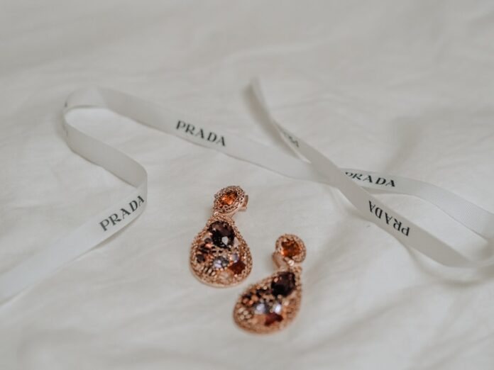 Photo by Laura Chouette silver and gold heart shaped earrings