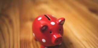 pink and black ceramic piggy bank