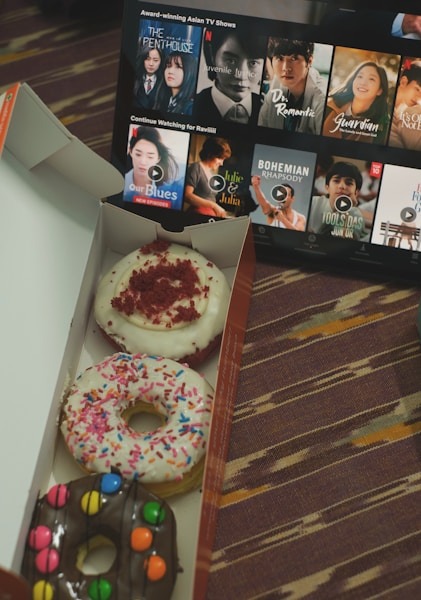 Photo by Ravi Sharma a box of donuts