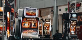 a row of slot machines sitting next to each other
