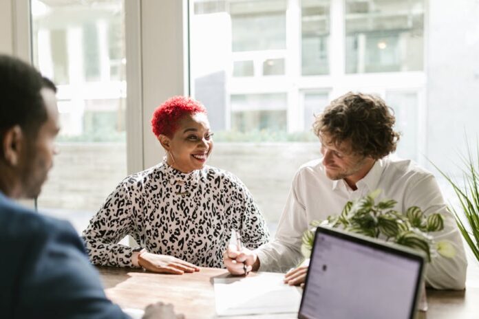 Photo by RDNE Stock project Casual business meeting with diverse professionals discussing a project.