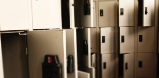 A row of open lockers in a secure indoor storage area, ideal for storing valuables.