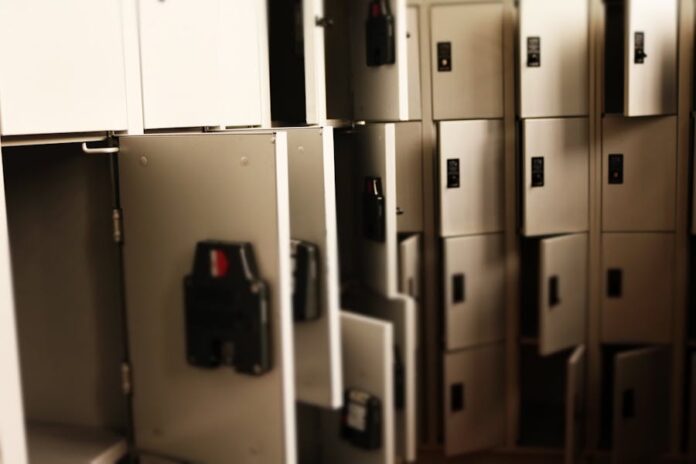 Photo by Paula A row of open lockers in a secure indoor storage area, ideal for storing valuables.