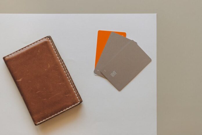 Photo by Nataliya Vaitkevich A leather wallet and credit cards on a minimalist background, ideal for financial themes.