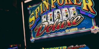 A casino machine with a slot machine next to it