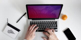 person using laptop computer