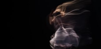 dancing woman on concrete pavement