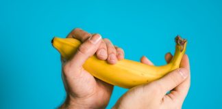 person holding banana