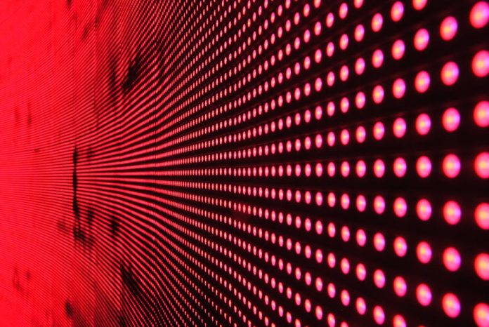 Photo by Pixabay Vibrant abstract pattern of illuminated red LED lights forming a dynamic design.