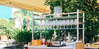 a kitchen with a table and chairs