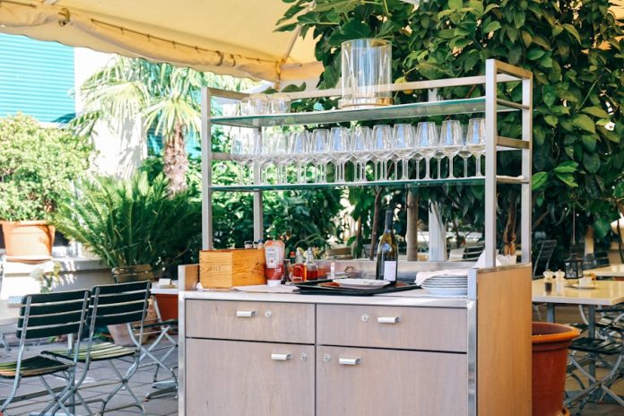Photo by tommao wang a kitchen with a table and chairs