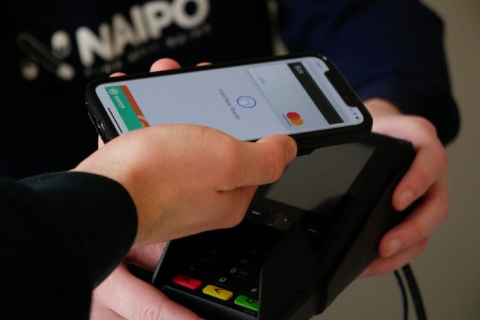 Photo by naipo.de person holding black android smartphone