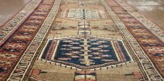 a large oriental rug on a wooden floor