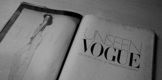 an open book with a picture of a woman in a dress