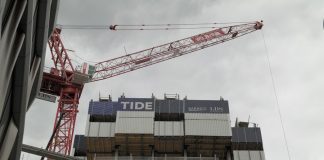 The Impact of Technology on Jobs in Cities Like London a crane that is on top of a building