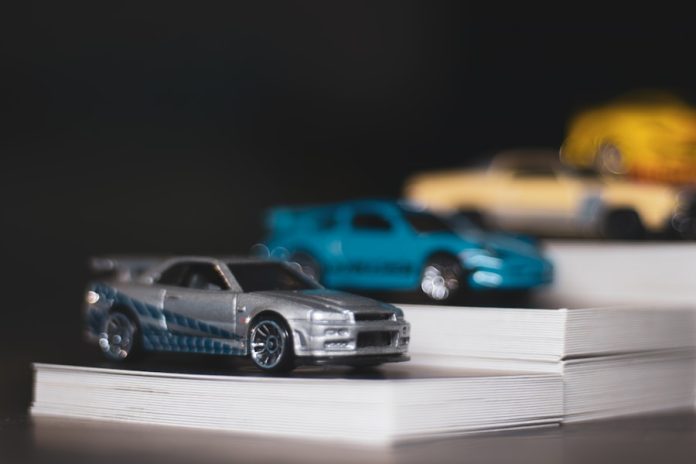Photo by Rakesh Sitnoor blue and black chevrolet camaro scale model