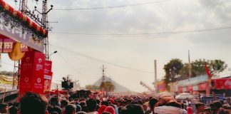 Crowd Management Plans Fail When Access Control Lags A crowd of people standing around a stage