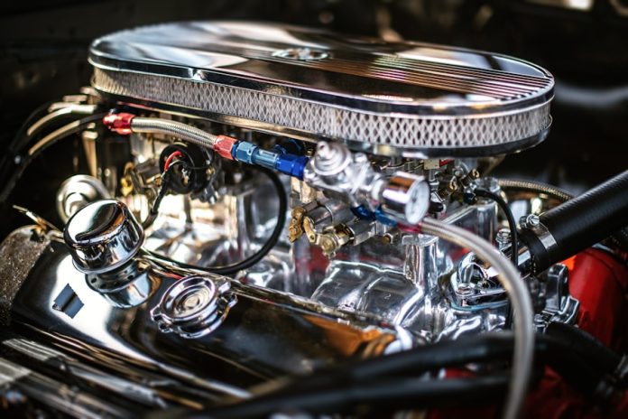 Photo by Tim Mossholder close-up photography of vehicle engine