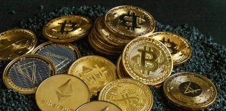 a pile of gold and silver bitcoins