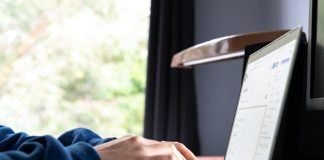 AI Checker: Your Best Friend for Fresh, High-Quality Content person using macbook pro on table