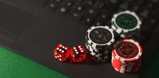 A close up of chips and dice AI-generated content may be incorrect.