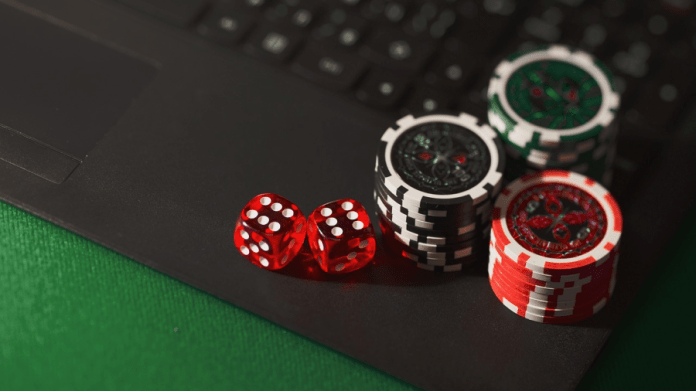 A close up of chips and dice AI-generated content may be incorrect.