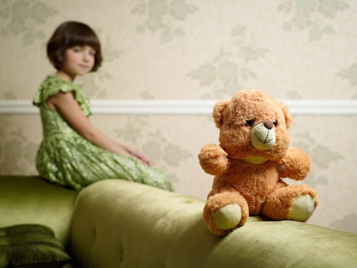 Photo by Максим Власенко selective focus photography of brown bear plush toy on sofa