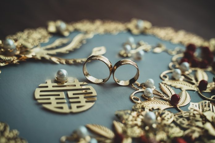Photo by king kong gold and silver beaded necklace